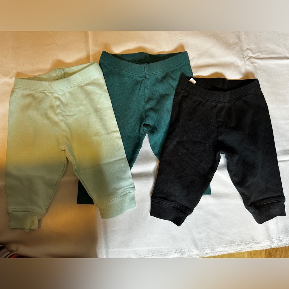 Three 0-3 primary baby pant